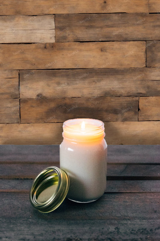 Pioneer wall boards wallpaper pattern with lit jar candle and lid on counter