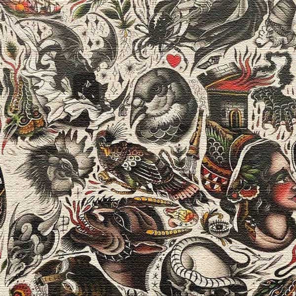 Vintage tattoo-style design with birds, faces, and other elements on a textured background.